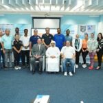 25 college students within the swimming coaches workshop in Abu Dhabi