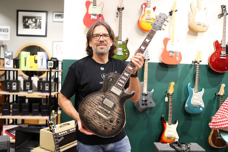 Meet Nik Huber, whose electrical guitars are placing a chord worldwide